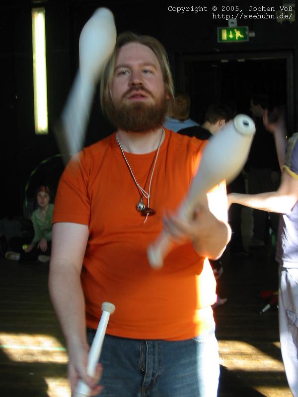 [Jochen, barely juggling clubs]